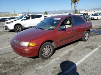  Salvage Mazda Protege