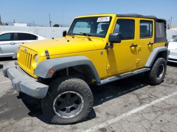  Salvage Jeep Wrangler